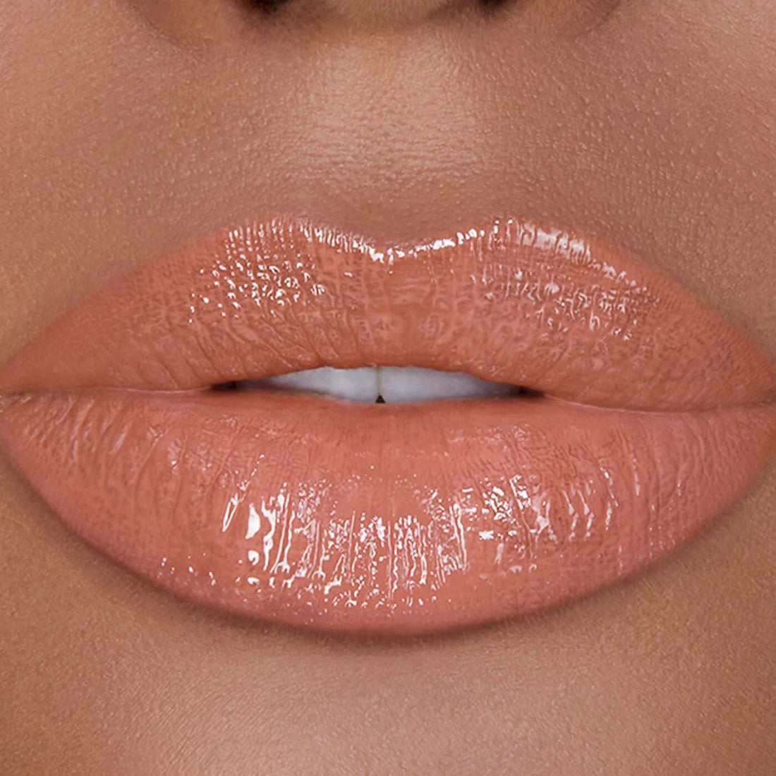 Unreal™ High Shine Volumizing Lip Gloss