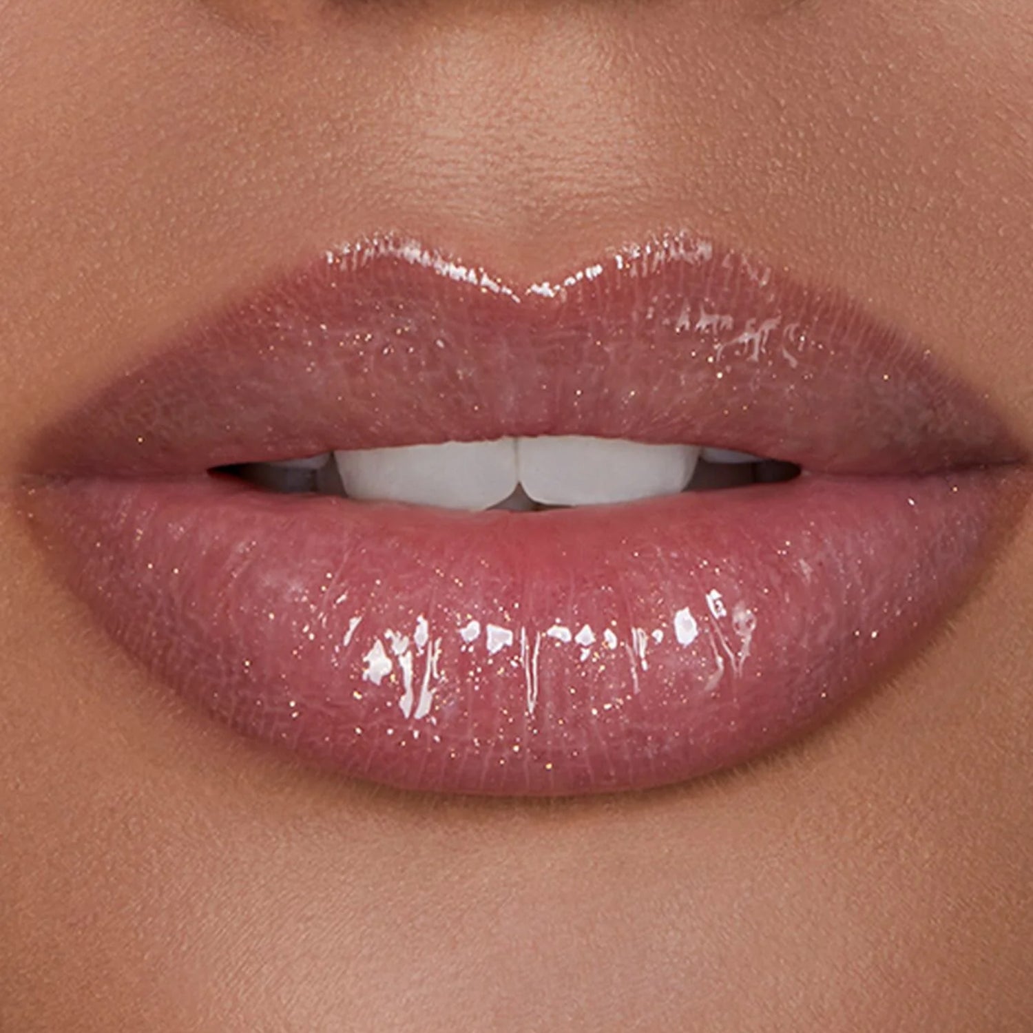 Unreal™ High Shine Volumizing Lip Gloss